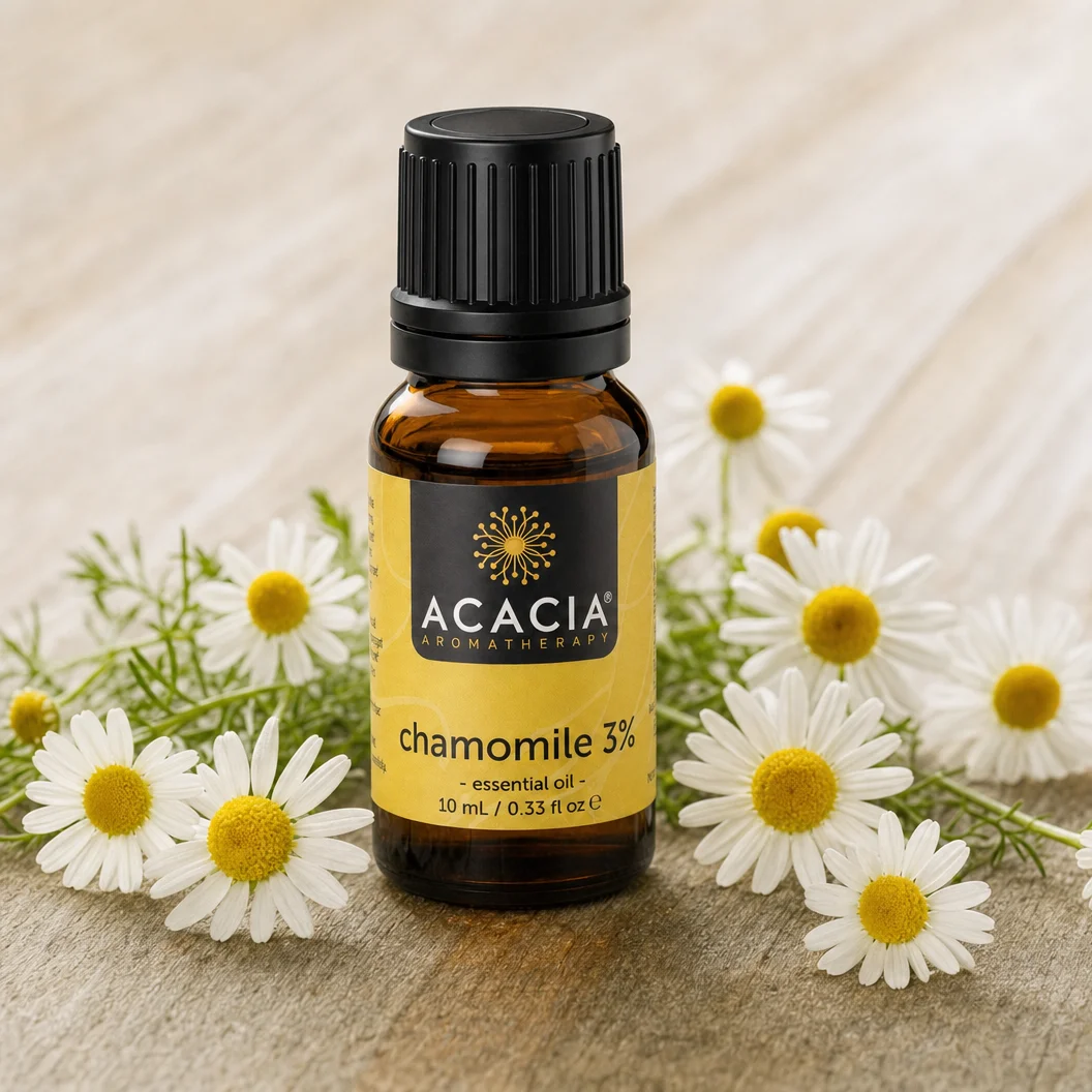 Chamomile Essential Oil 3% 10mL lifestyle – Acacia Aromatherapy bottle with fresh chamomile flowers on wooden surface, Australia