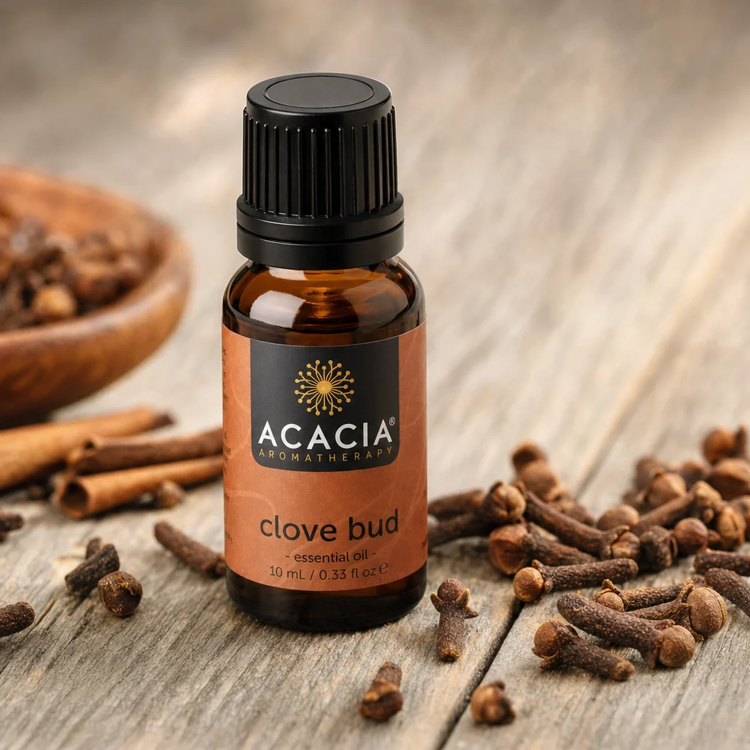 Clove Bud Pure Essential Oil 10mL lifestyle – Acacia Aromatherapy bottle with clove buds on wooden surface, Australia