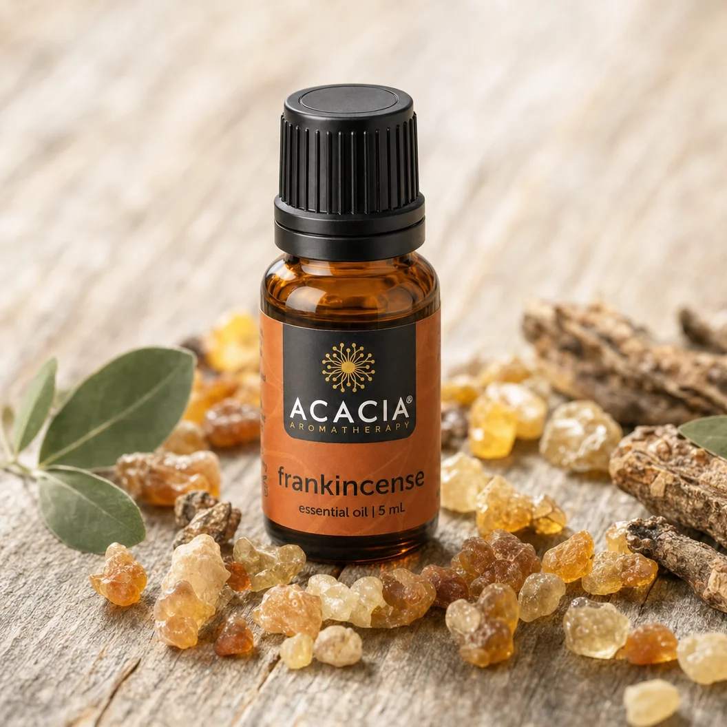 Frankincense Pure Essential Oil 5mL lifestyle – Acacia Aromatherapy bottle with frankincense resin on wooden surface, Australia