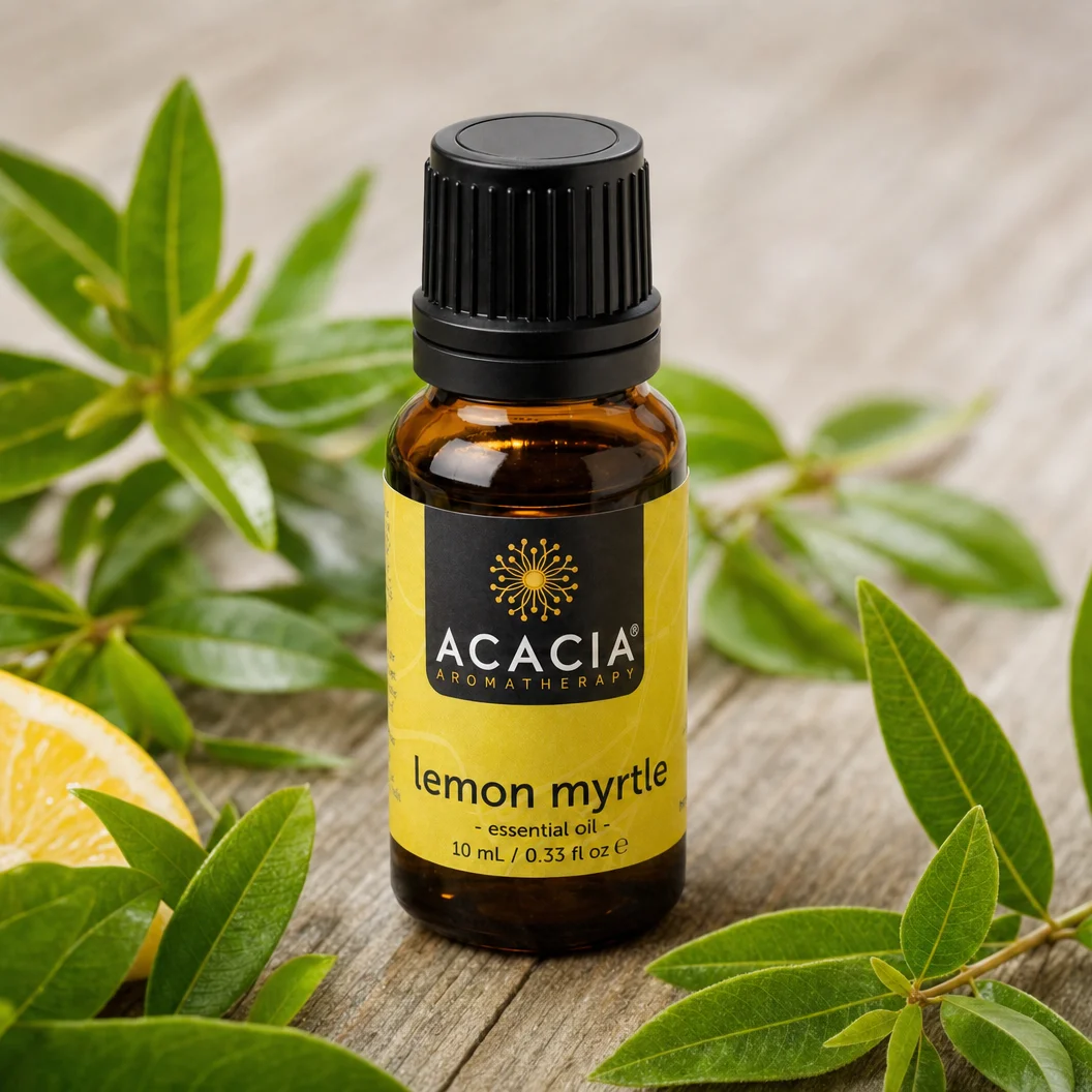 Lemon Myrtle Pure Essential Oil 10mL lifestyle – Acacia Aromatherapy bottle with lemon myrtle leaves on wooden surface, Australia